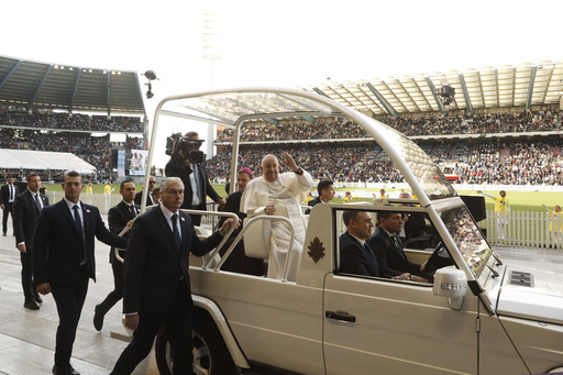 Pope Francis arriving at holy mass